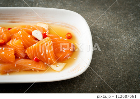 fresh salmon raw marinated shoyu or salmon pickled soy sauce fresh salmon raw marinated shoyu or salmon pickled soy sauce 112687661