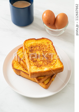 french toast on white plate 112687662