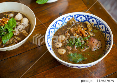 Thai boat noodles with wagyu 112687679