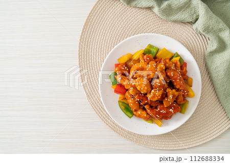 fried crispy chicken with sweet and sour sauce fried crispy chicken with sweet and sour sauce 112688334