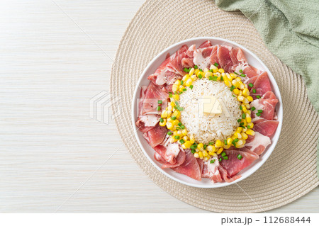 fresh pork raw sliced with rice and corn on plate and ready to cook fresh pork raw sliced with rice and corn on plate and ready to cook 112688444