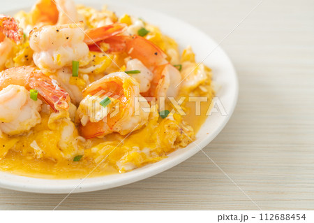 creamy omelet with shrimps or scrambled eggs and shrimps 112688454