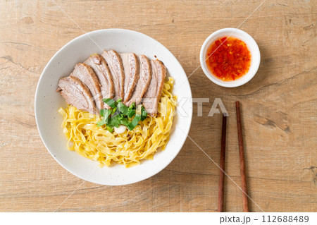 dried duck noodles in white bowl dried duck noodles in white bowl 112688489