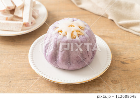 taro bun with white sugar cream and nut taro bun with white sugar cream and nut 112688648