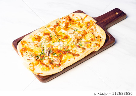 tart flambe seafood pizza on wood board 112688656
