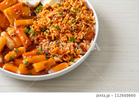 Korean instant noodles with Korean rice cake and fish cake and boiled egg 112688660