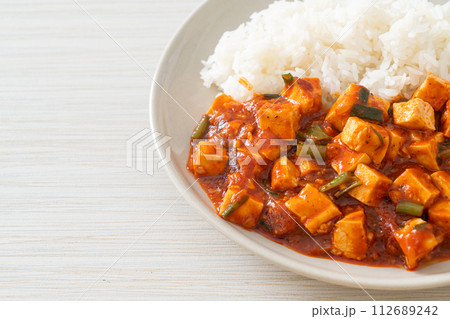 Mapo Tofu - The traditional Sichuan dish of silken tofu and ground beef, packed with mala flavor from chili oil and Sichuan peppercorns. 112689242