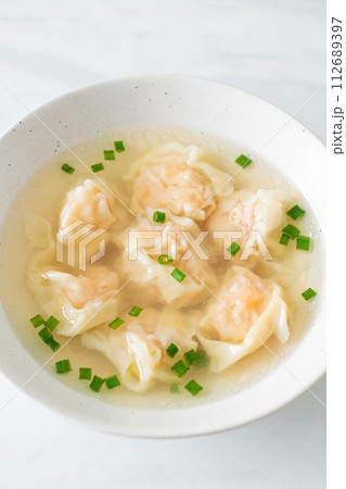 shrimp dumpling soup in white bowl shrimp dumpling soup in white bowl 112689397