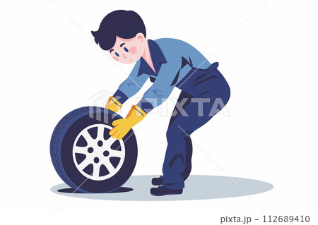 タイヤ交換をする男性作業員 112689410
