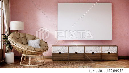 Smart Tv on Cabinet in Living room with white  wall on white floor and armchair. 112690554