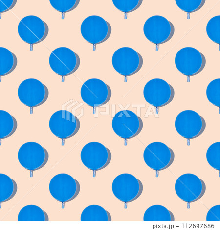 Seamless pattern of blue balloons isolated on pink background. Holidays and love concept. Seamless pattern of blue balloons isolated on pink background. Holidays and love concept. 112697686