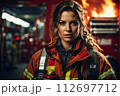 AI-generated content. Young Female Firefighter with Fire Extinguisher during Fire Incident 112697712