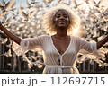 AI-generated content. Young Afro-American Woman with White Doves. 112697715