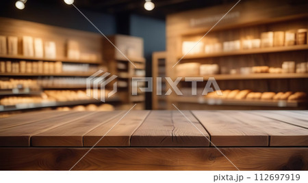 Empty table top with supermarket blurred defocused panorama, bokeh light. Backdrop for display montage products. Blank wood textured counter, blur grocery, bio eco market store background. Front view 112697919