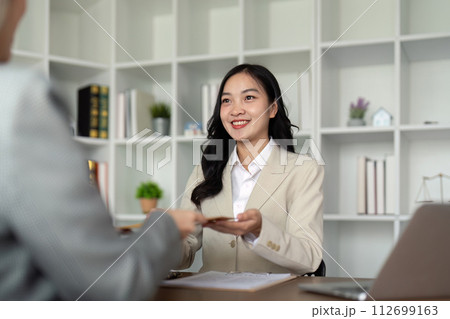 Company hired the lawyer office as a legal advisor and draft the contract so that the client could signs the right contract. Contract of sale was on the table in the lawyer office 112699163