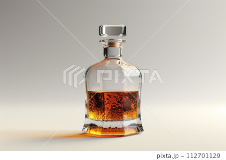 Bottle of premium alcohol, amber color, isolated on white background. A bottle Of Whiskey. A bottle of elite alcohol in amber color, highlighted on a white background 112701129