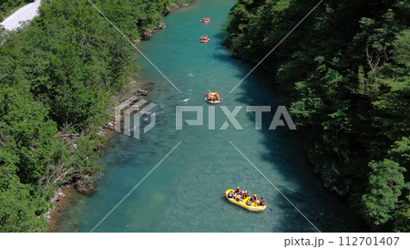 Rafting boat on summer mountain river Rafting boat on summer mountain river 112701407