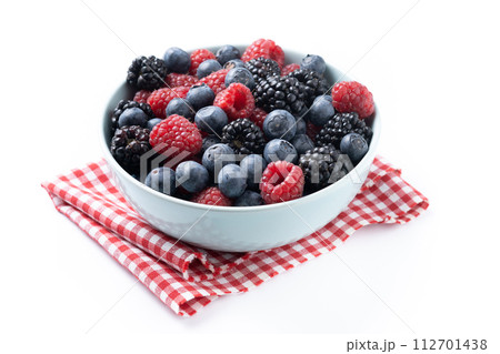 Fresh assortment berries in bowl isolated on white background Fresh assortment berries in bowl isolated on white background 112701438