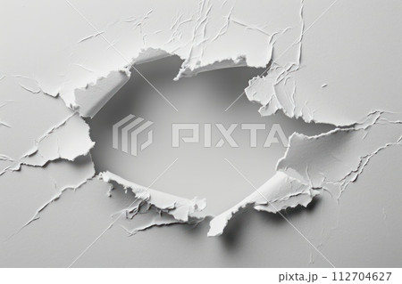 Torn white paper with a circular gap in the middle. Generative AI 112704627