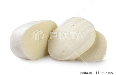 Mozzarella and two pieces close-up on a white. Isolated 112707409
