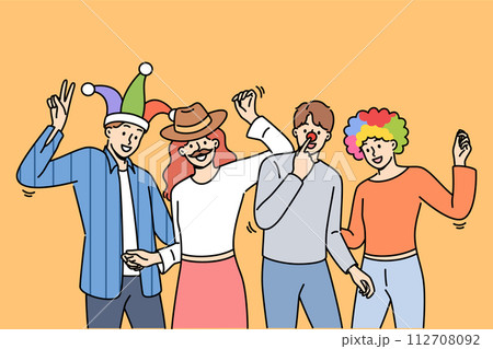 Group of friends participating in masquerade, dancing and enjoying festive party Group of friends participating in masquerade, dancing and enjoying festive party 112708092