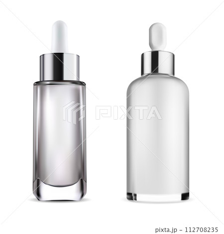 Dropper bottle. Transparent glass essential oil bottle 112708235