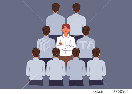 Man stands out from crowd of business colleagues due to individuality or better professional skills 112708596