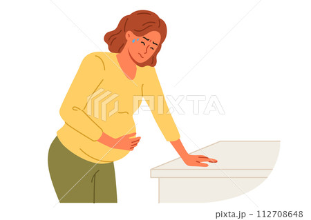 Pregnant woman holds stomach, for concept complications caused by fetal development disorders 112708648