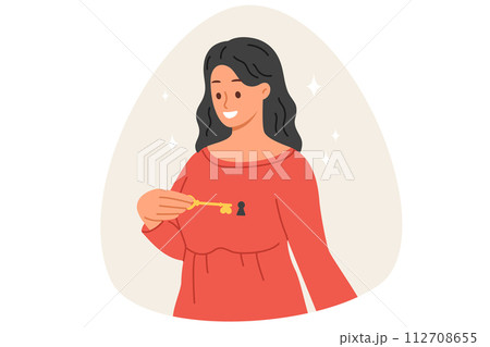 Woman with key to heart and keyhole in chest, as metaphor for love and readiness for relationship 112708655