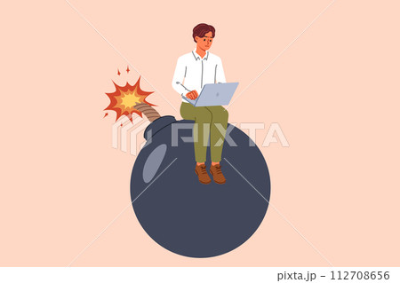 Business man is in danger due to investment in risky project, sitting on bomb with laptop on lap 112708656