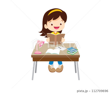 student sitting on desk working for homework student sitting on desk working for homework 112709696