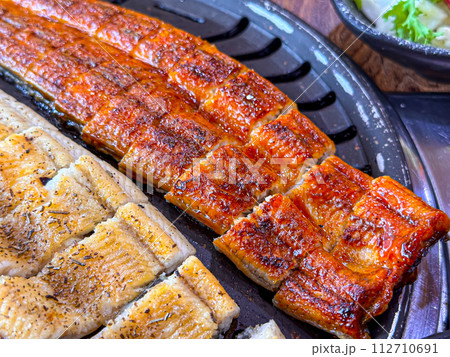 Korean food. Grilled eel grilled salt and seasoned Korean food. Grilled eel grilled salt and seasoned 112710691