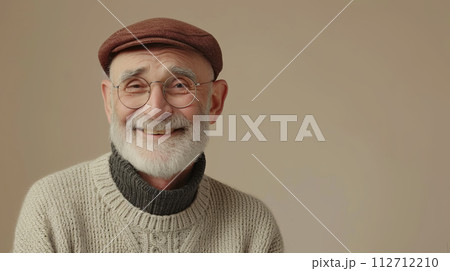 stylish Senior man in the hat smiling positive emotions on pastel background with place for text 112712210