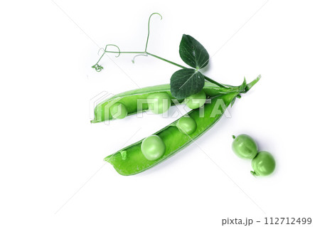 Open pod of green peas, isolated on a white background. 112712499