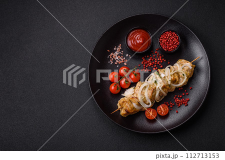 Delicious fresh chicken meat kebab with salt, spices and herbs 112713153