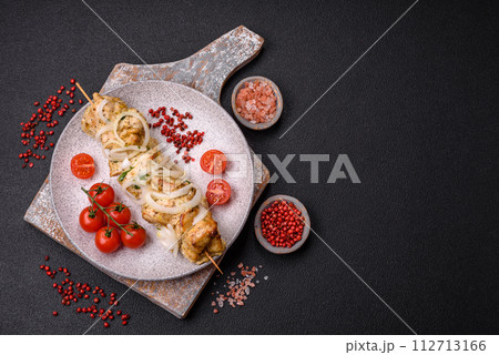 Delicious fresh chicken meat kebab with salt, spices and herbs 112713166