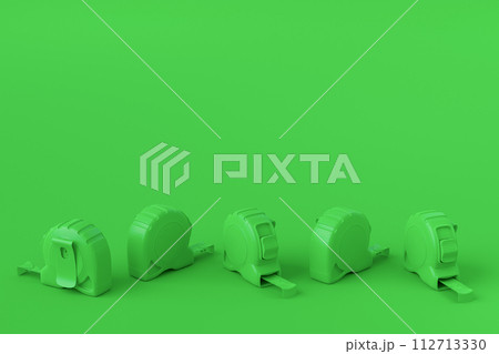 Set of monochrome carpenter measuring tape on multicolor background with units scale Set of monochrome carpenter measuring tape on multicolor background with units scale 112713330