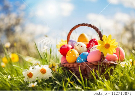 Easter basket with eggs and flowers Easter basket with eggs and flowers 112713875