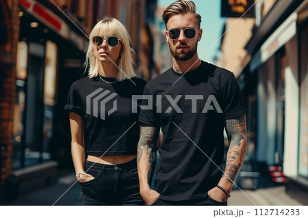 Man and woman wearing blank t-shirt 112714233