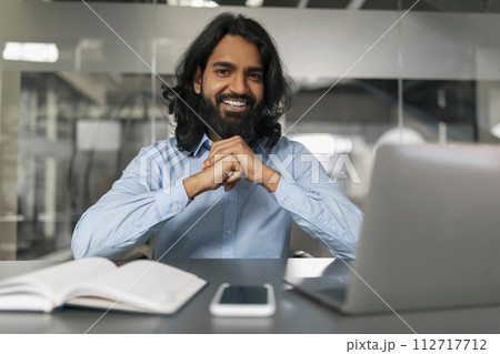 Happy man in office posing for photo 112717712