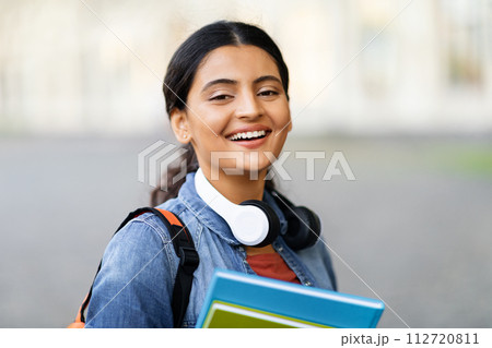 Portrait of arab young woman student posing outdoors Portrait of arab young woman student posing outdoors 112720811