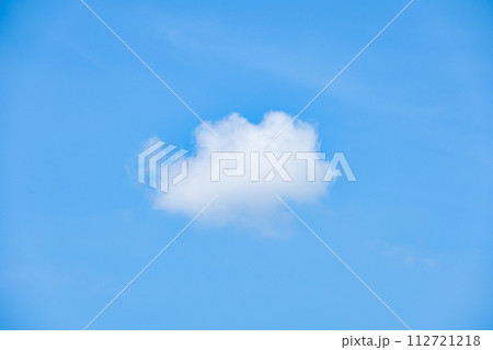 beautiful blue sky and white fluffy single cloud with sunrise in the morning, natural background 112721218