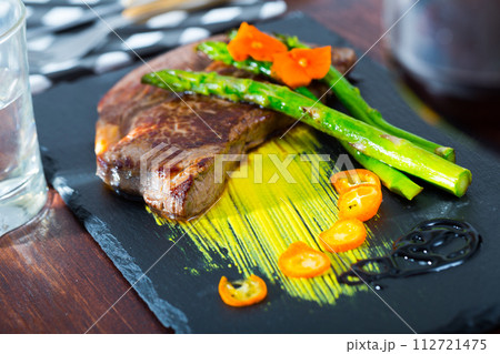 Tasty juicy roasted beef steak 112721475