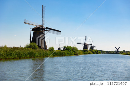 System of ancient windmills ar Kinderdijk, Netherlands 112721497