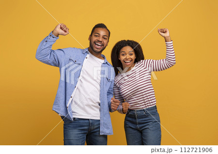 Happy Win. Portrait Of Joyful Excited African American Couple Celebrating Success 112721906