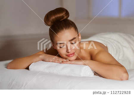 Aroma Massage. Woman Relaxing In Spa Salon With Closed Eyes 112722928