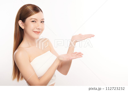 Beautiful young asian woman with clean fresh skin on white background, Face care, Facial treatment, Cosmetology, beauty and spa, Asian women portrait. 112723232