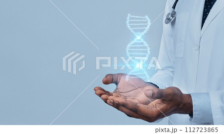 Black medical doctor geneticist hands holding DNA hologram 112723865