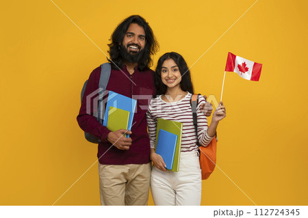 Cheerful indian man and woman choosing education abroad 112724345