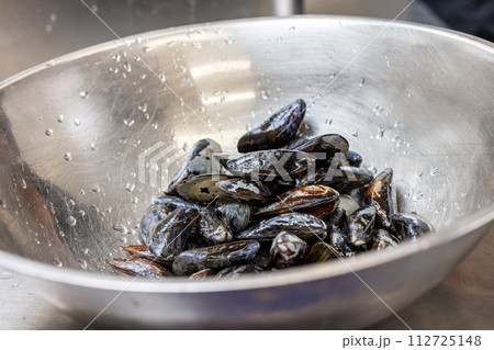 Fresh Mussels in Stainless Steel Bowl Fresh Mussels in Stainless Steel Bowl 112725148